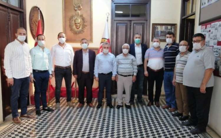 MHP'den İGC'ye Kutlama Ziyareti